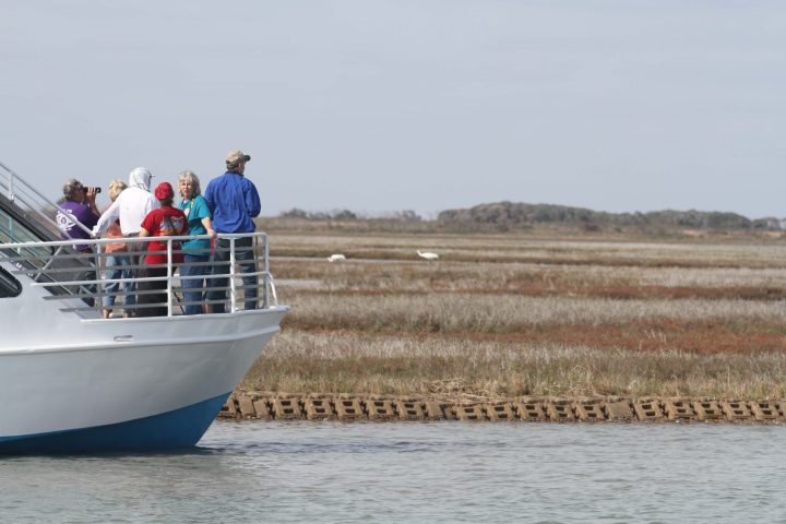 a small boat in a body of water
